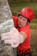 06-8098 Rock Climber Reaches the Top of "Y Crack" Route, Goldsborough Crag, Teesdale, County Durham
